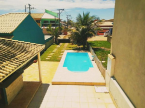Casa em Cabo Frio com piscina há poucos passos do Mar!